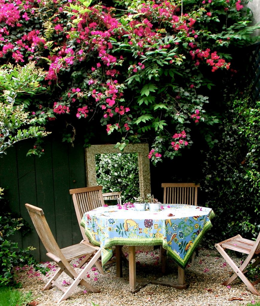 Patterned round tablecloth in a garden dining area