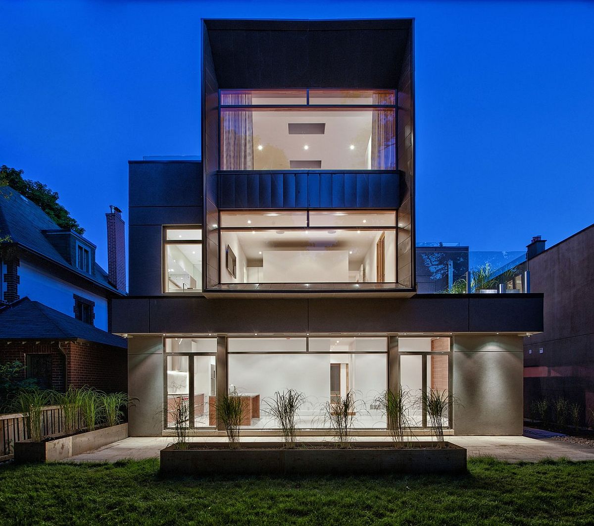 Rear facade of the home opens up to the garden and the view beyond