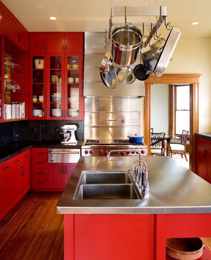 Red kitchen with pots overhead