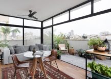 Rooftop-level-living-and-balcony-of-the-Tel-Aviv-home-217x155