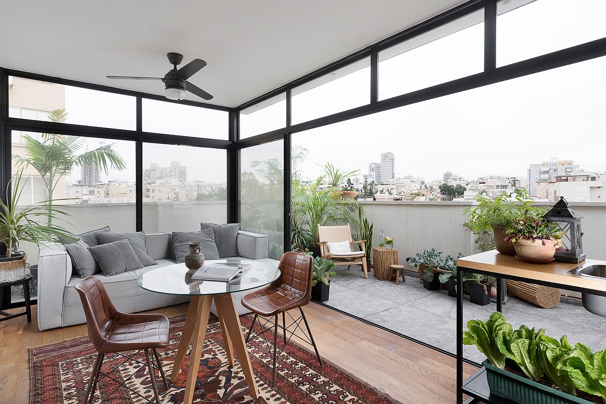 Rooftop level living and balcony of the Tel Aviv home