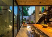 Series-of-glass-walls-up-up-the-multi-level-home-to-the-world-outside-217x155