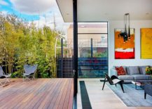 Sliding-doors-connect-the-new-living-area-with-the-small-deck-outside-217x155