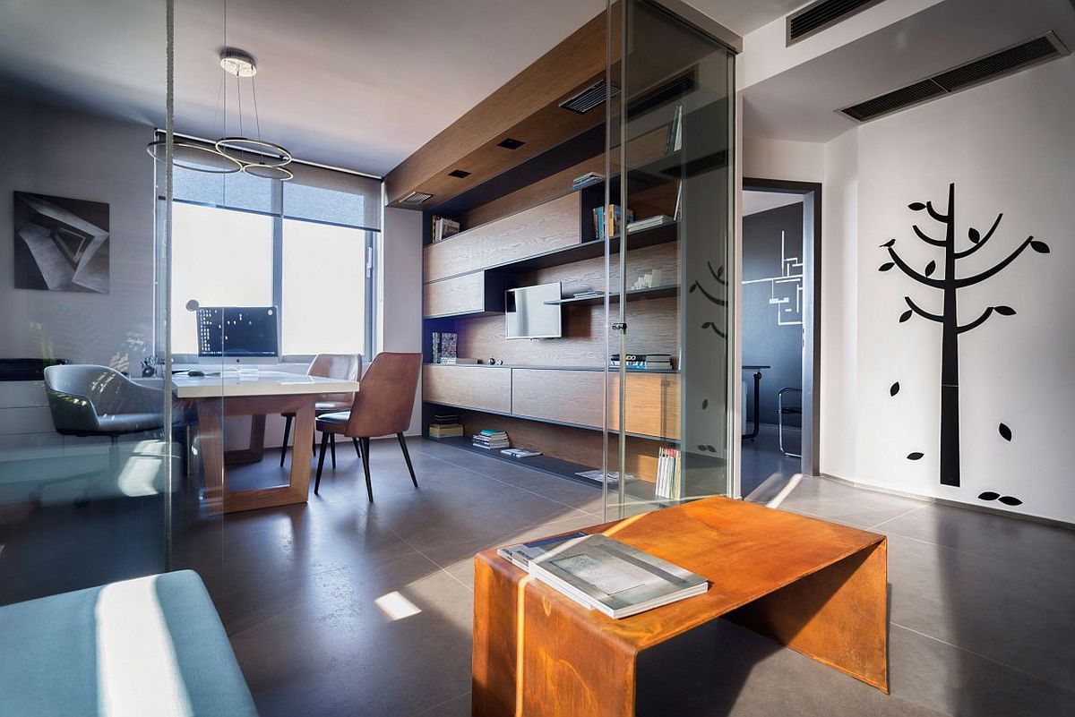 Sliding glass doors connect the office space with the lounge