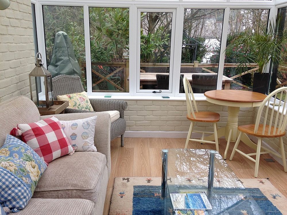 Small and beautiful sunroom with lovely view of the outdoors [Design: Tracey Mannell Interiors]