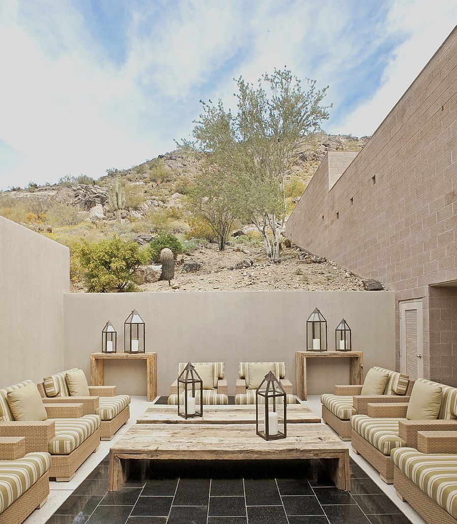 Small and private courtyard with breezy ambiance and wonderful lighting [Design: Palm Design Group]