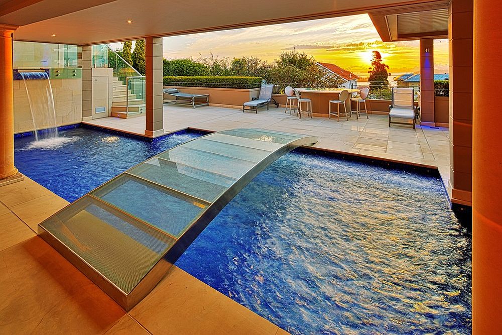 Smart and stylish bridge for the charming indoor pool [Design: Artesian Pools]