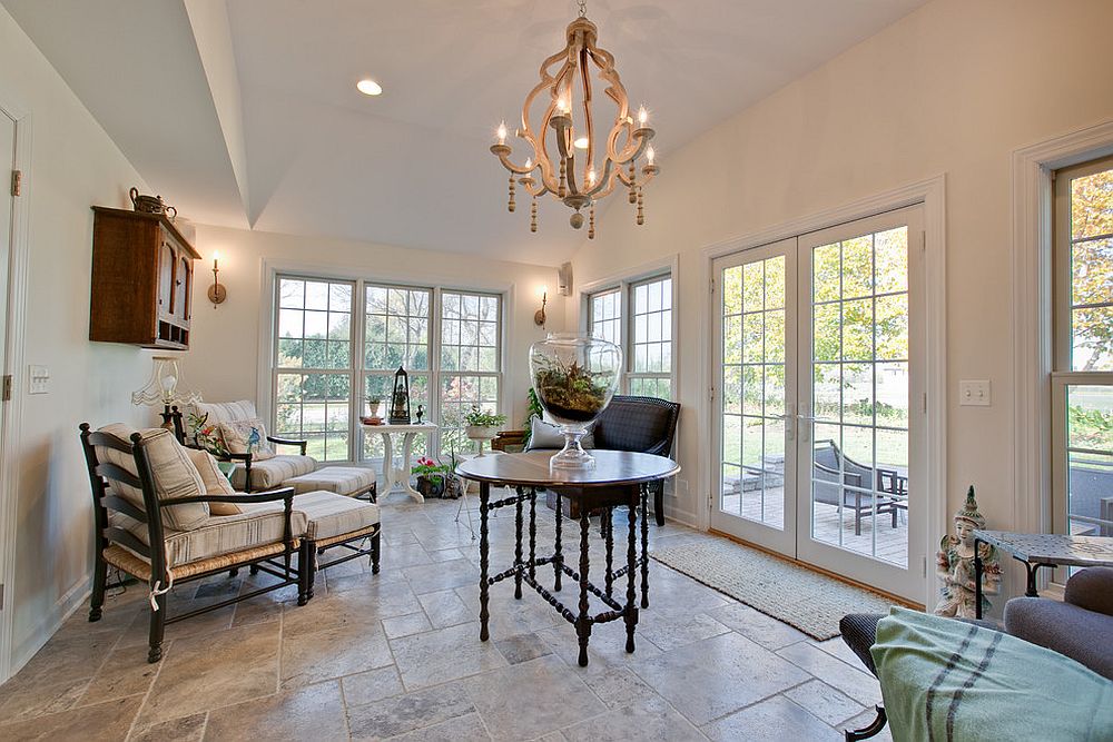 Spacious shabby chic style sunroom with ample storage and seating