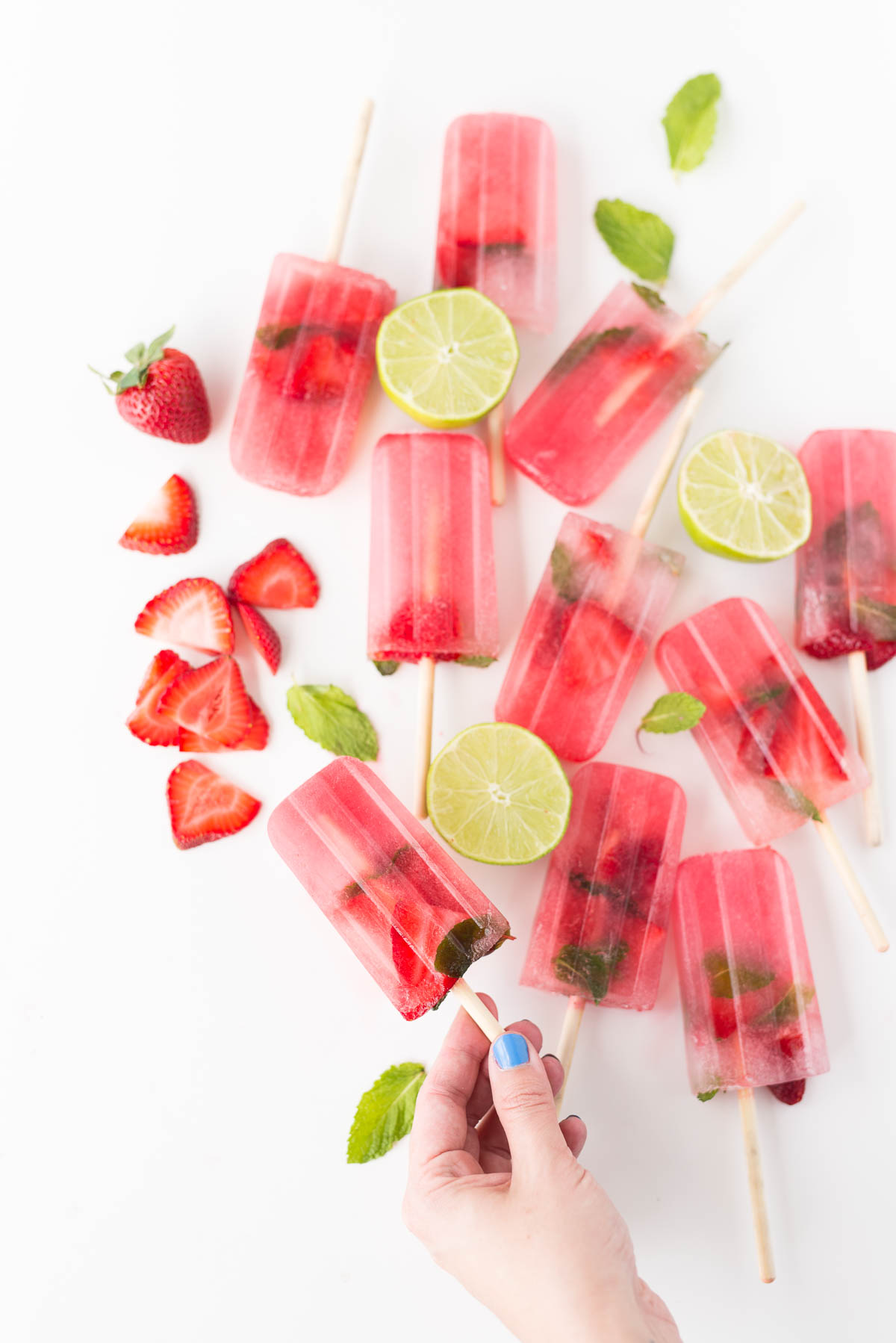 Strawberry mojito popsicles from Paper & Stitch