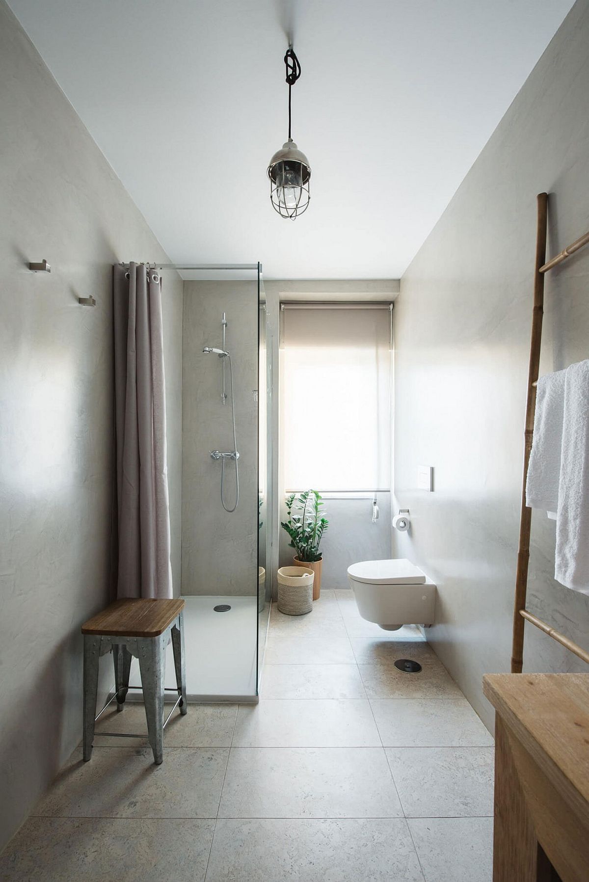 Stylish Scandinavian bathroom filled with ample natural light