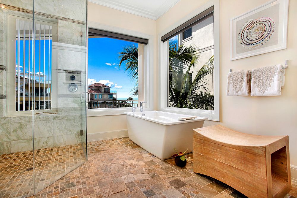 Tropical bathroom with unique decor and a smart shower area