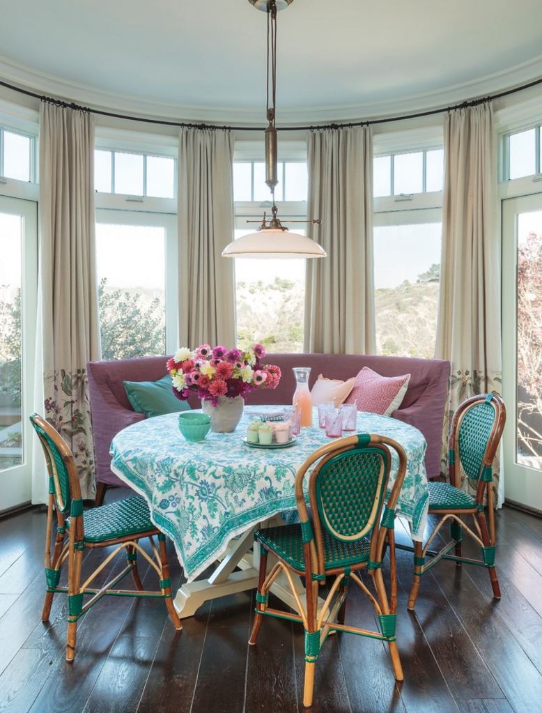 Vibrant turquoise and white tablecloth for a light-filled beach house