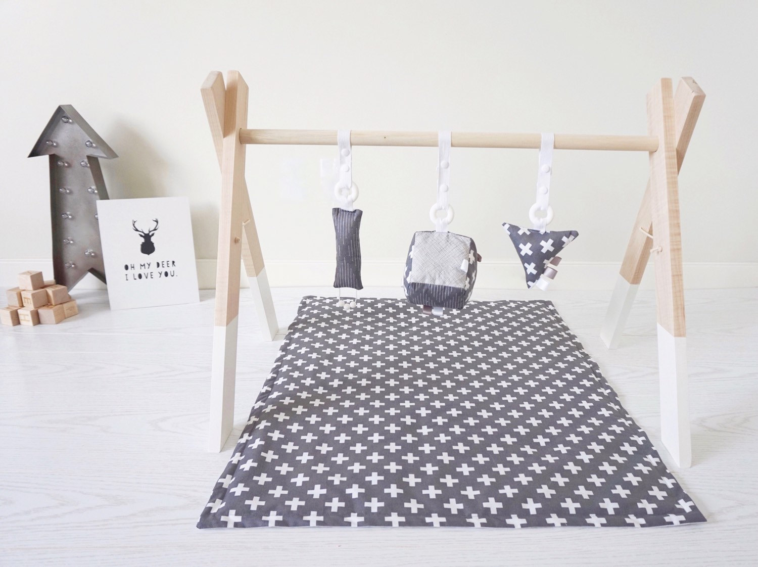 Wooden baby gym from August Lace Designs