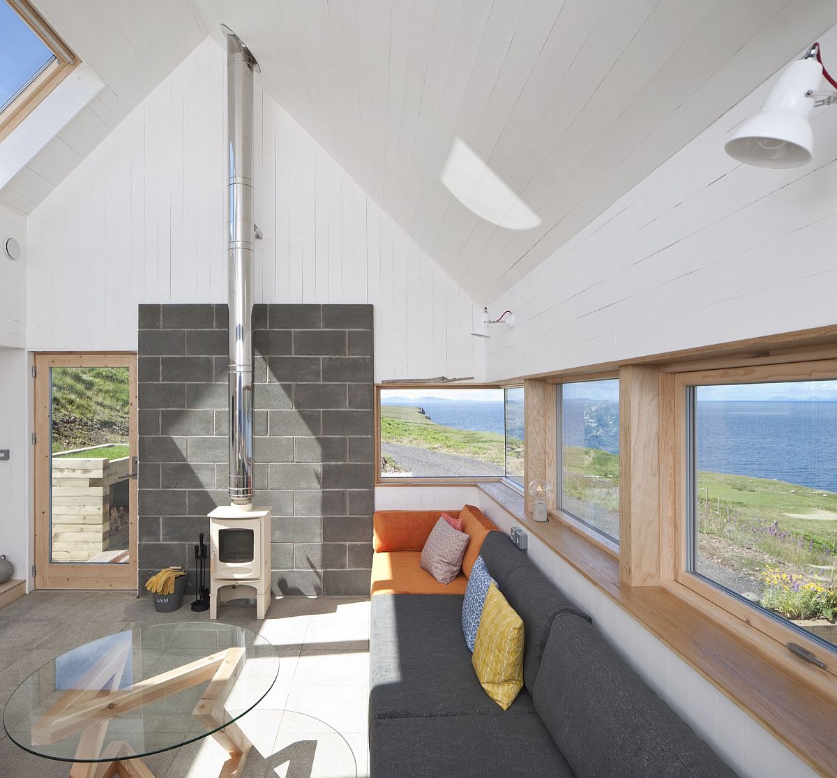 A series of timber framed windows connect the social zone with the outdoors