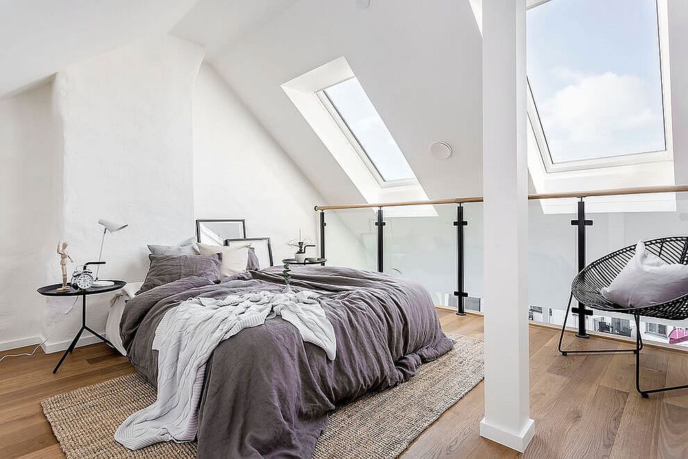 Attic windows bring in plenty of light into the relaxing bedroom