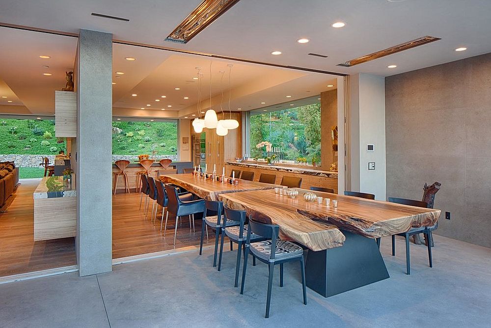 Awesome 24 foot suar slab dining table creates a marvelous indoor and outdoor dining space [Design: Matrix Design]