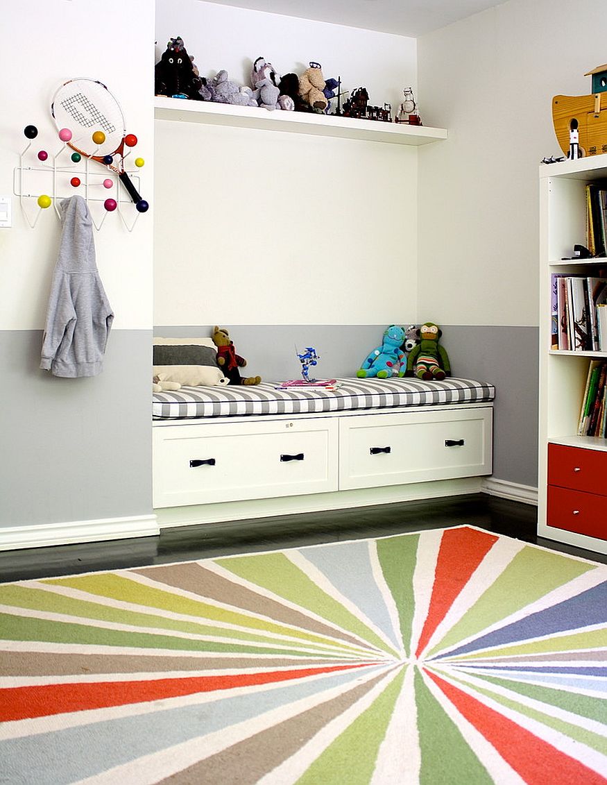 Bench with built-in storage in the corner of the transitional kids' bedroom [Design: Mace Contracting]