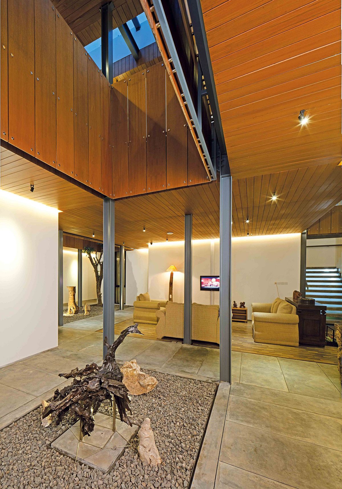 Central void inside the house brings light into the courtyard