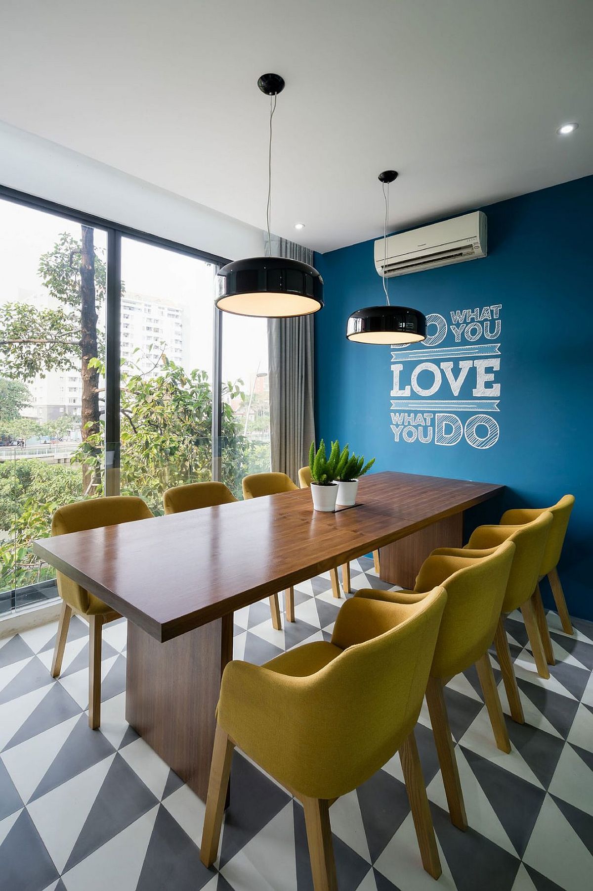 Conference area and workstation with a splash of blue and geo tiled flooring