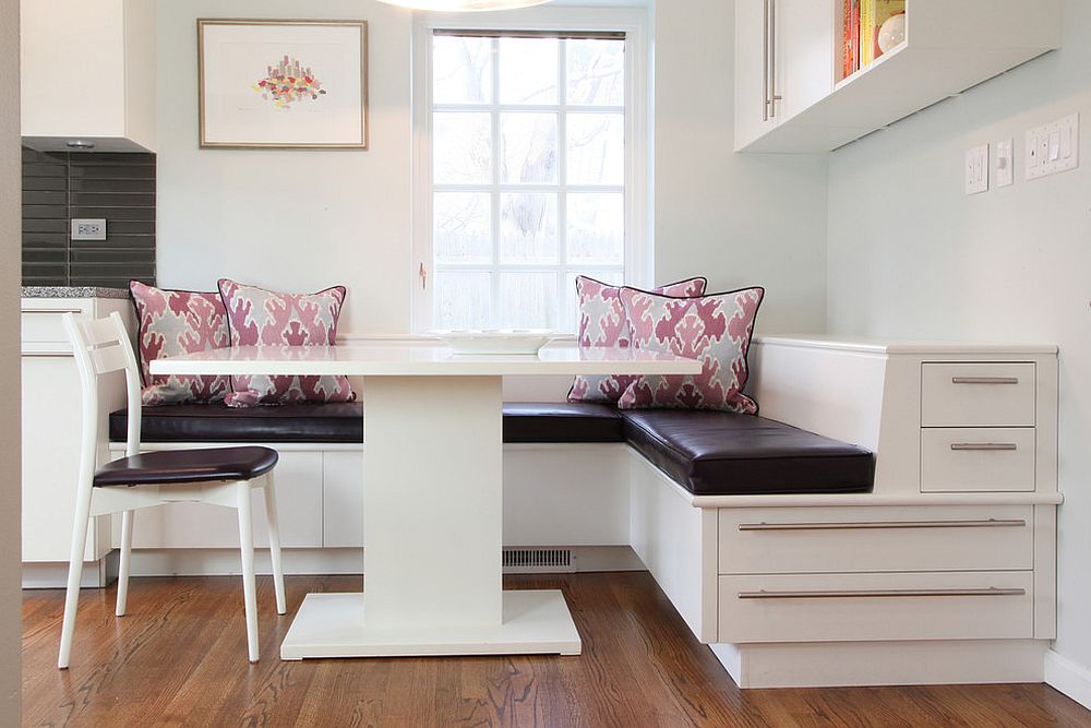 Contemporary banquette with storage maximizes the kitchen corner space [Design: Krieger + Associates Architects / Ann Kelly Interiors]