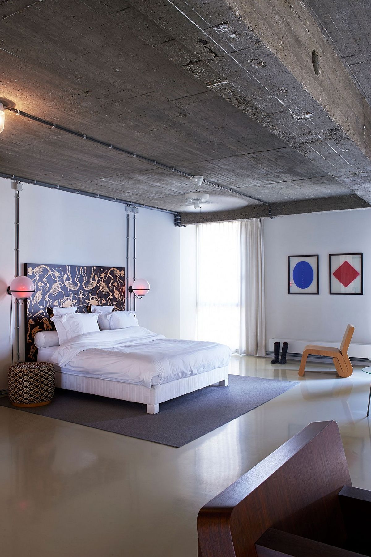 Contemporary bedroom in white with fabulous bedside lighting