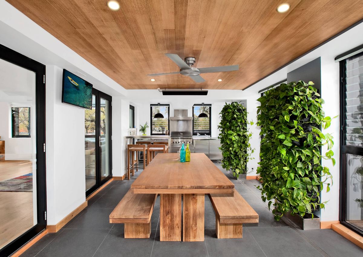 Contemporary dining room with vertical gardens