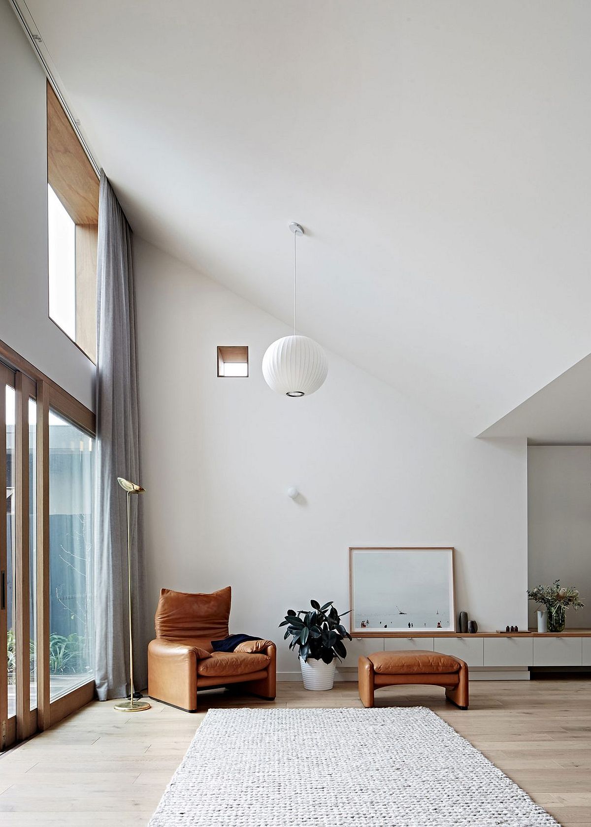 Contemporary living room with a cozy reading nook in the corner