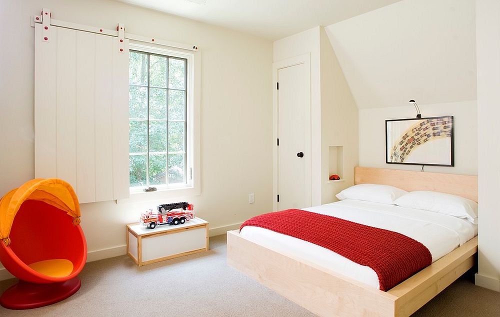 Creative kids' bedroom uses the sliding barn-style door as a window