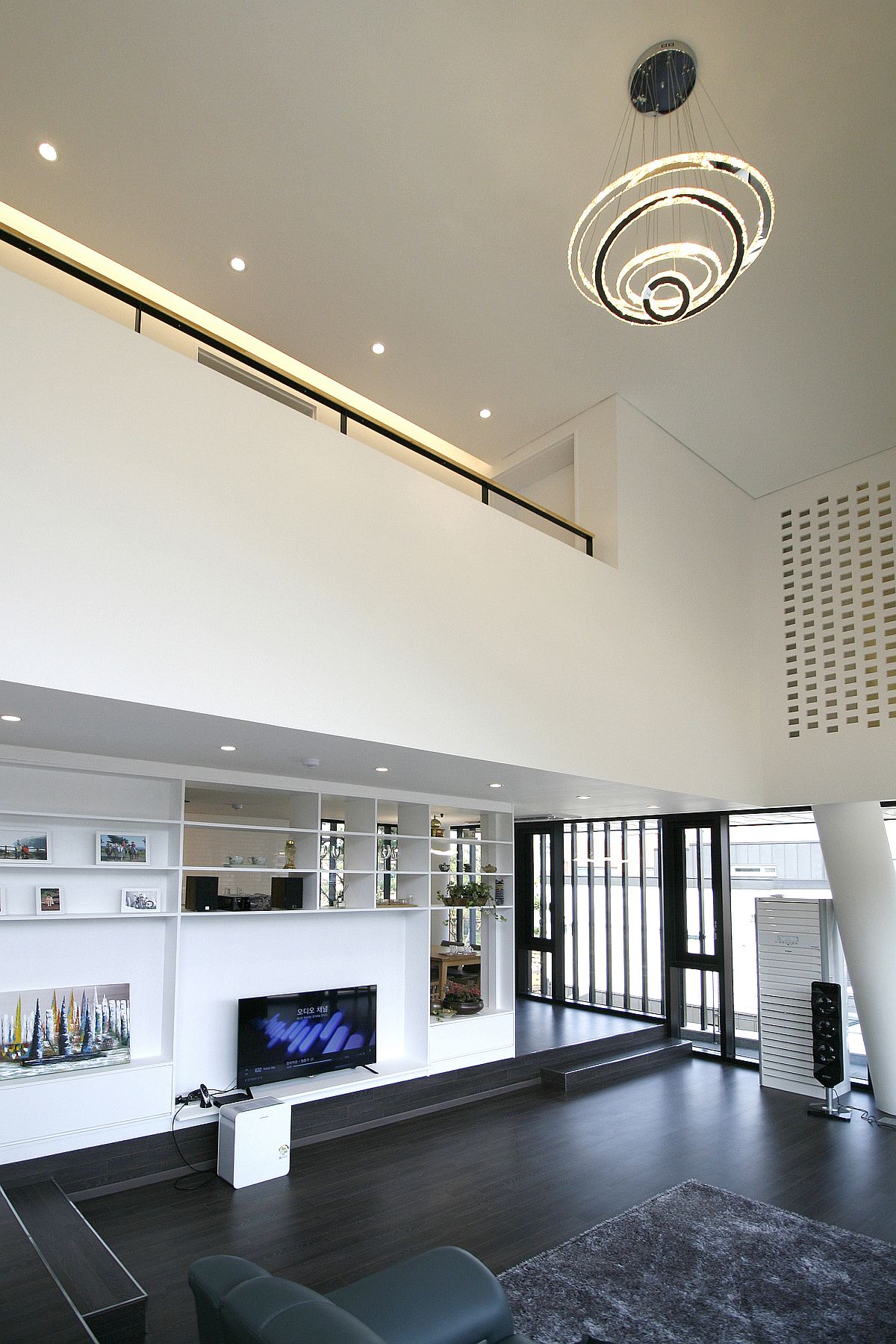 Double height contemporary living room of the South Korean home