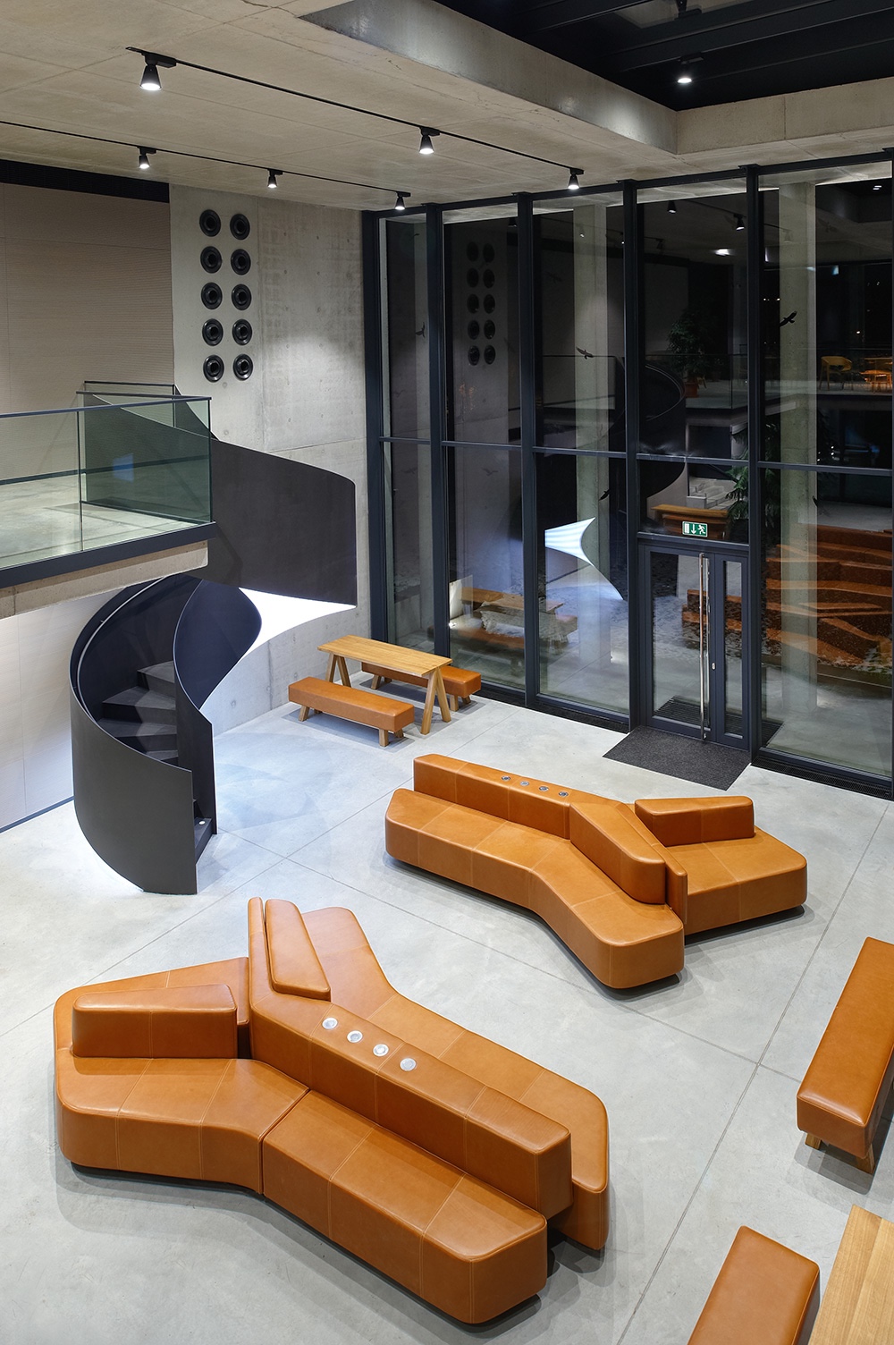 Economics Faculty of Czech University of Life Science in Prague by Luka Križek / IO Studio. Leather: Canyon in cognac.