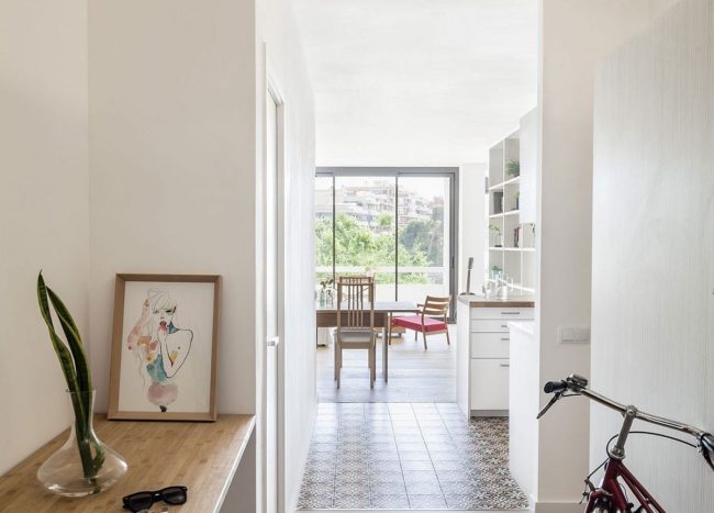 Sliding Doors Alter the Dynamics of Light-Filled Barcelona Apartment ...