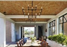 Expansive-Mediterranean-dining-room-with-natural-edge-dining-table-217x155