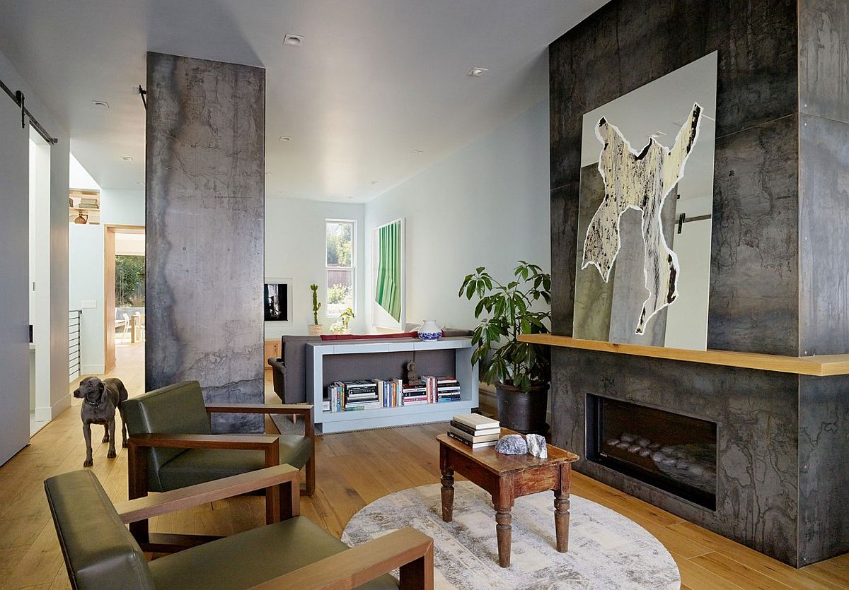 Exposed concrete surfaces add textural contrast to the modern interior of the Noe Valley House