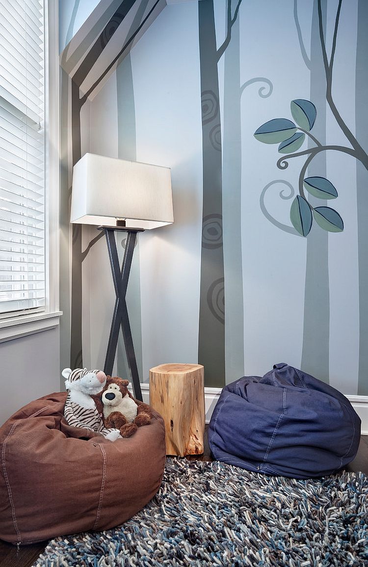 Floor lamp, wall paper and a small bean bag turn the corner into a relaxing space for your little one