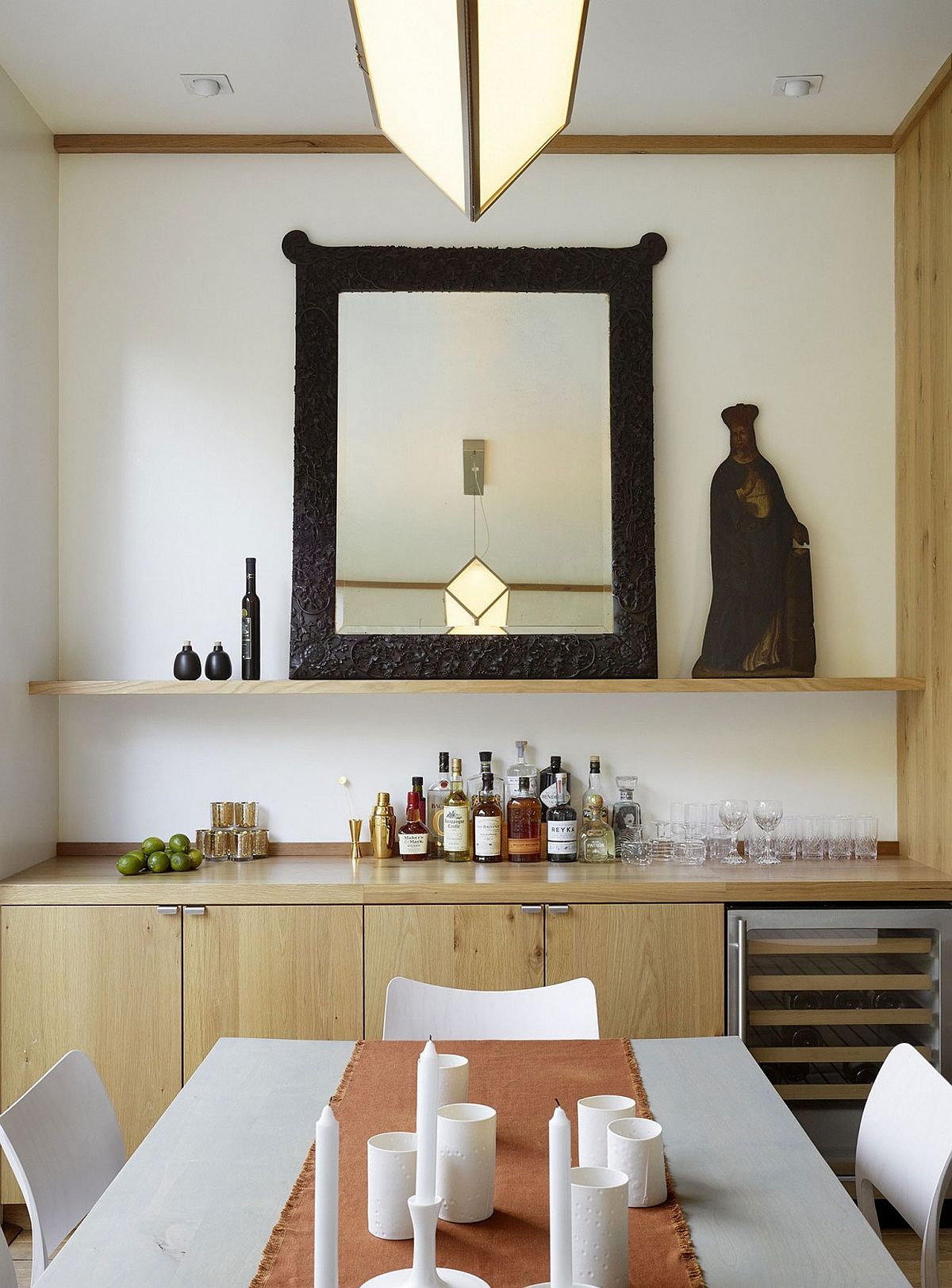 Formal dining room with a smart sideboard and a dining table in white