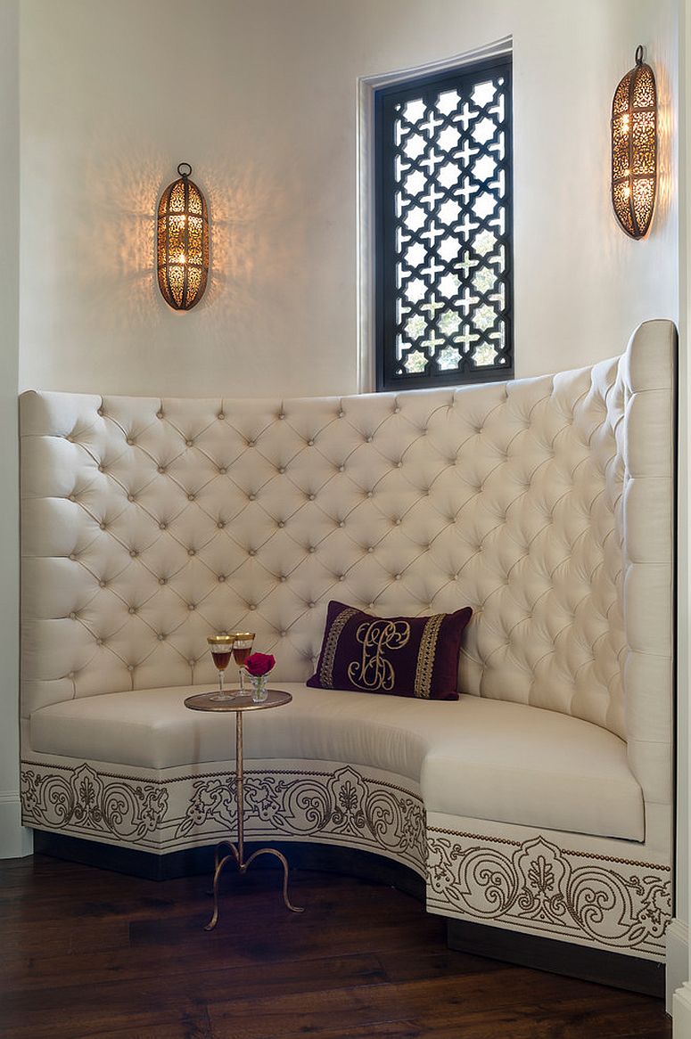 Give the dining banquette a distinct Moroccan vibe with lighting and ornate pattern [Design: Maison Maison design]