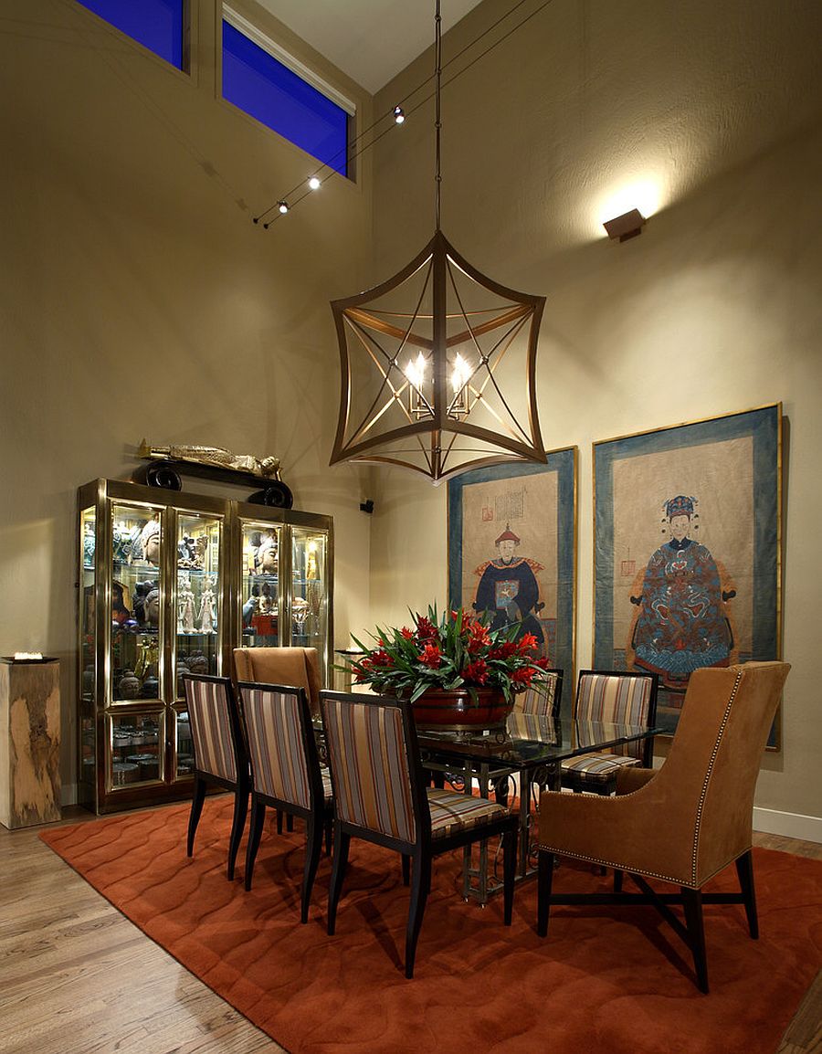 Glass cabinet display in the dining room filled with Chinese decorative pieces