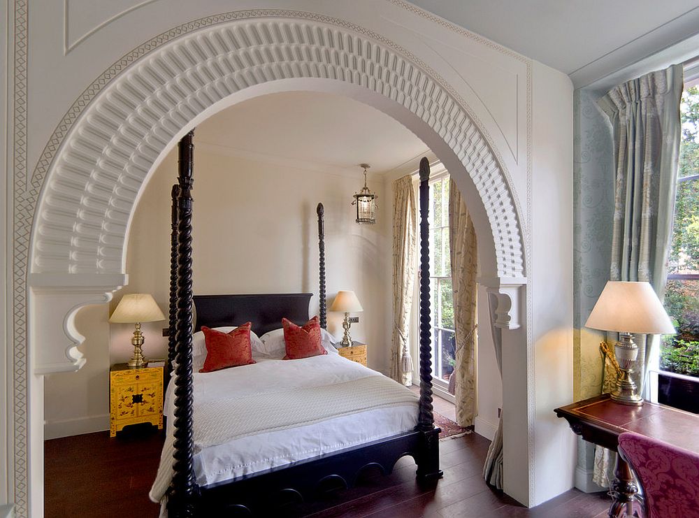 Gold bedside table becomes the focal point in this lovely Mediterranean bedroom [Design: Eliska Design Associates / Stephen Frak Photography]