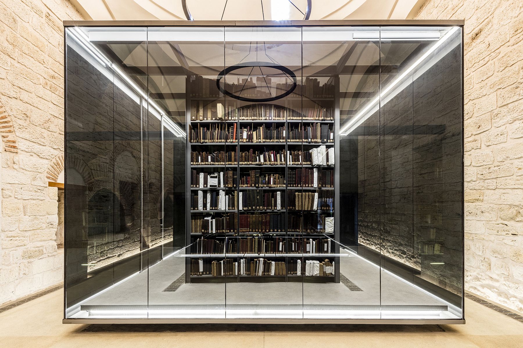 Gorgeous lit black glass boxes fit into the classic shell of the library perfectly