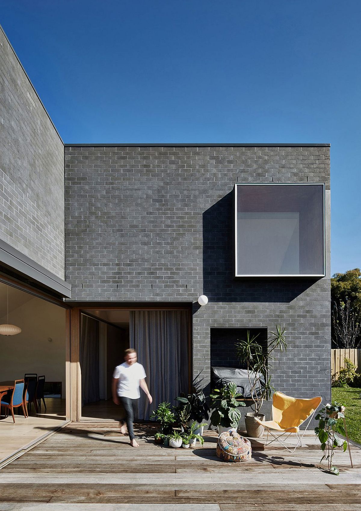 Gray brick exterior of the house gives it a modern appeal