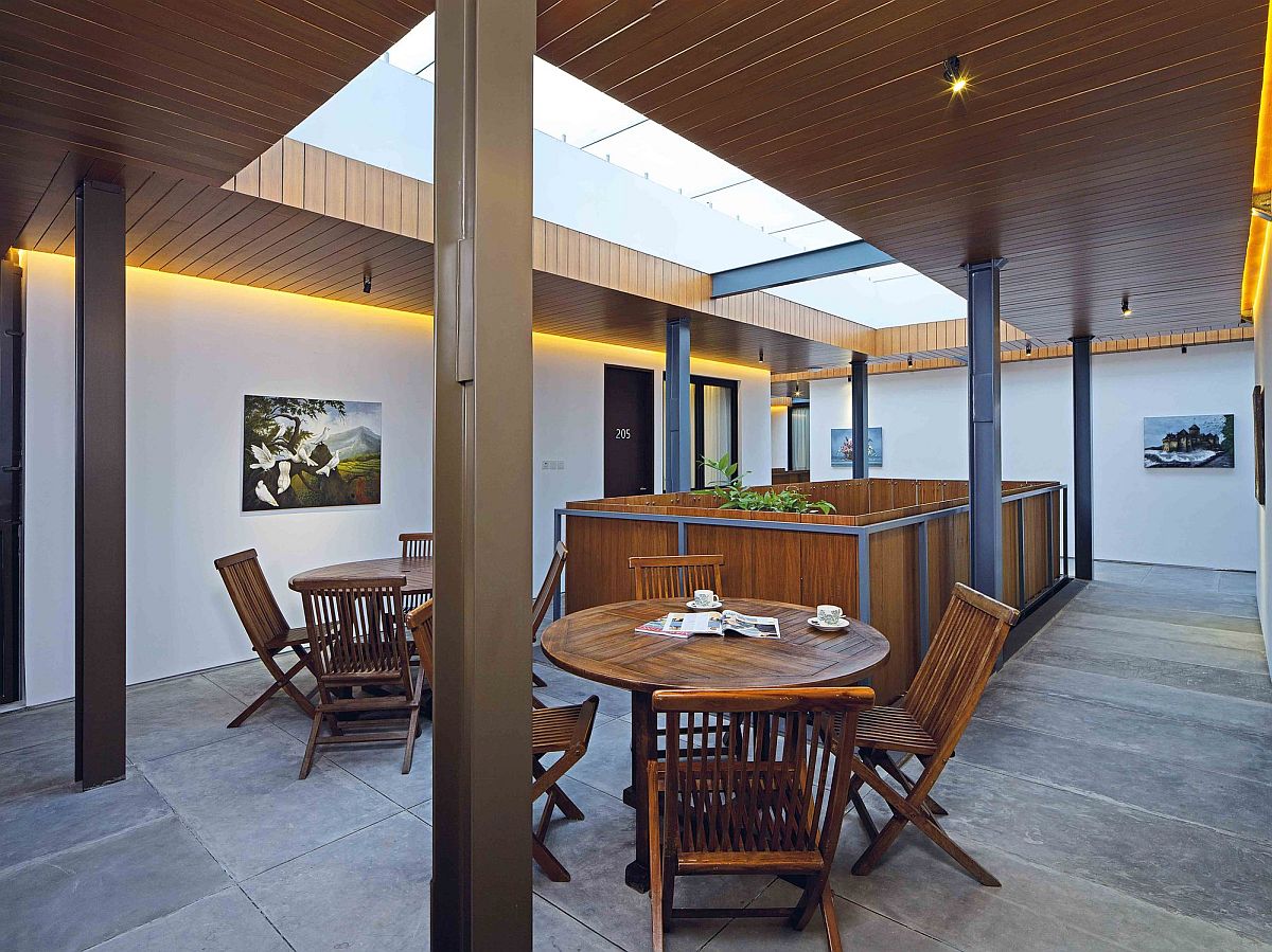 Indoor dining spaces and green hubs create a refreshing environment