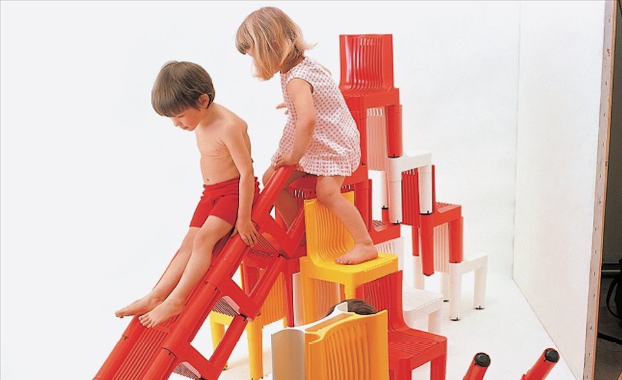 The stackable K 1340 polyethylene children's chair (1964) for Kartell was the first chair built entirely of injection moulded plastic. Designed by Richard Sapper and Marco Zanuso, it won the Prize Compasso d'ora in 1964 and the Gold Medal Triennial in 1964. Image via Artspace.