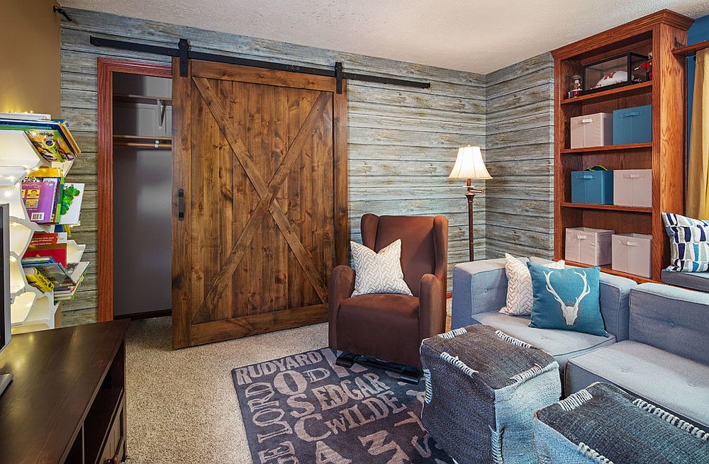 Kids' media room and play area with a striking, sliding barn door