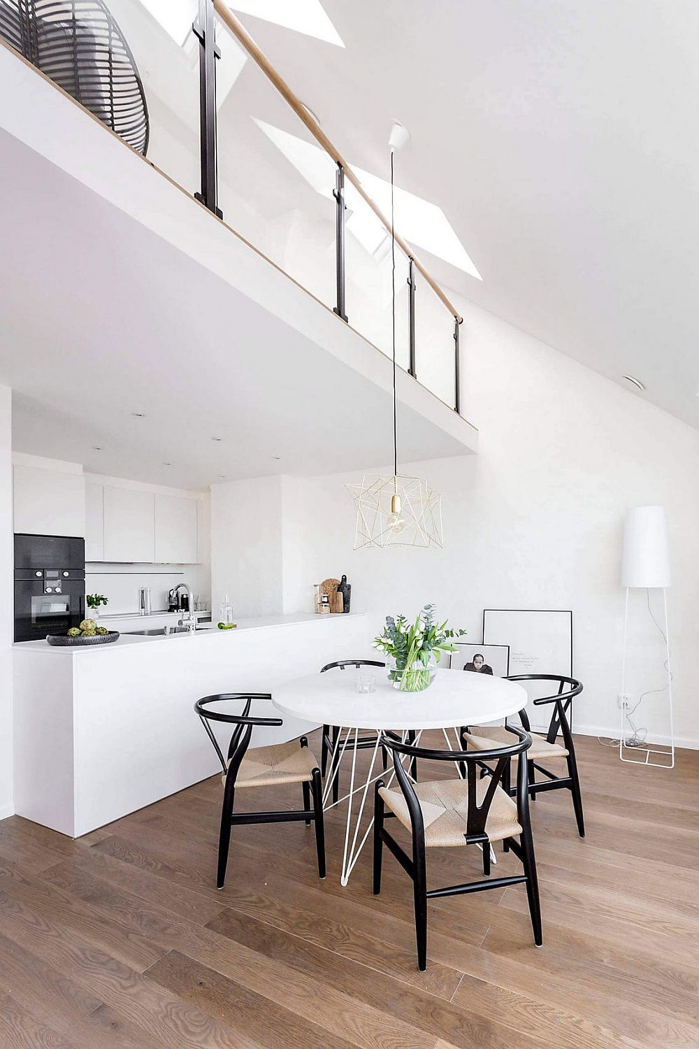 Kitchen and dining area in black and white