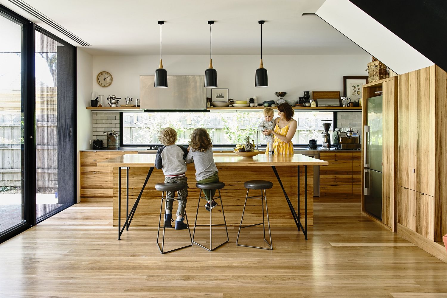 Kitchen becomes the social zone of the extended Melbourne home