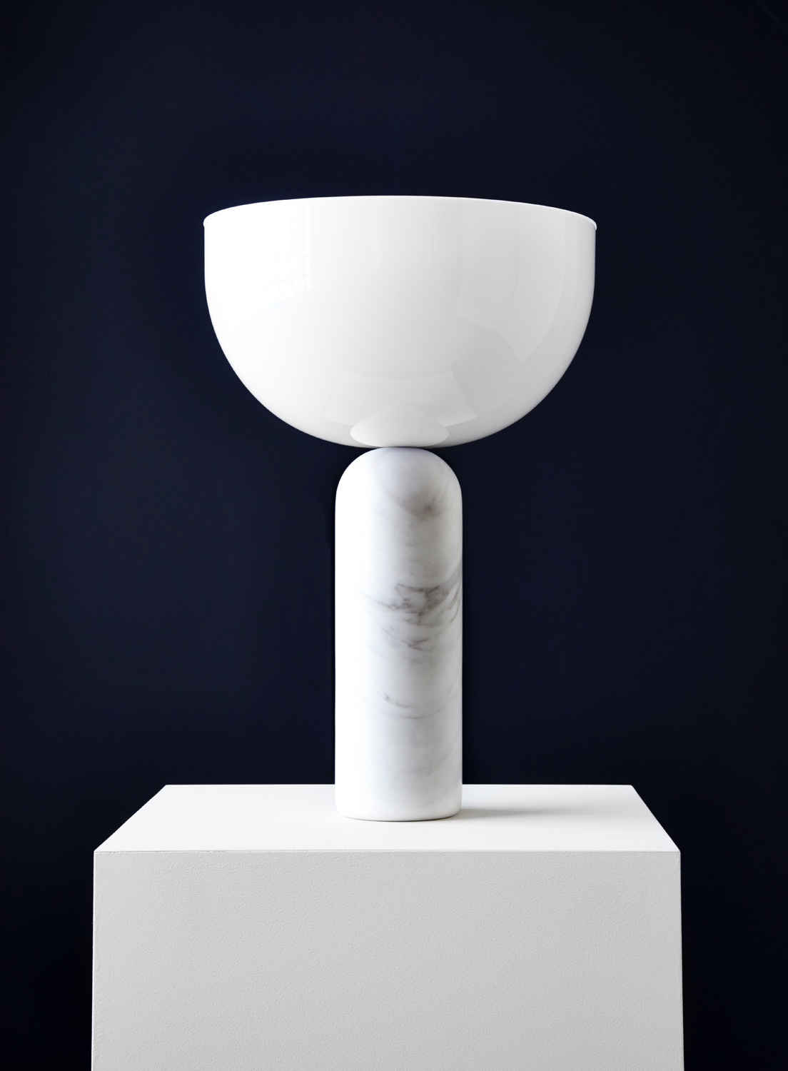 Kizu Table Lamp designed by Lars Tornøe. A bold and sculptural light, Kizu executes a graceful balancing act between its acrylic shade and marble base.