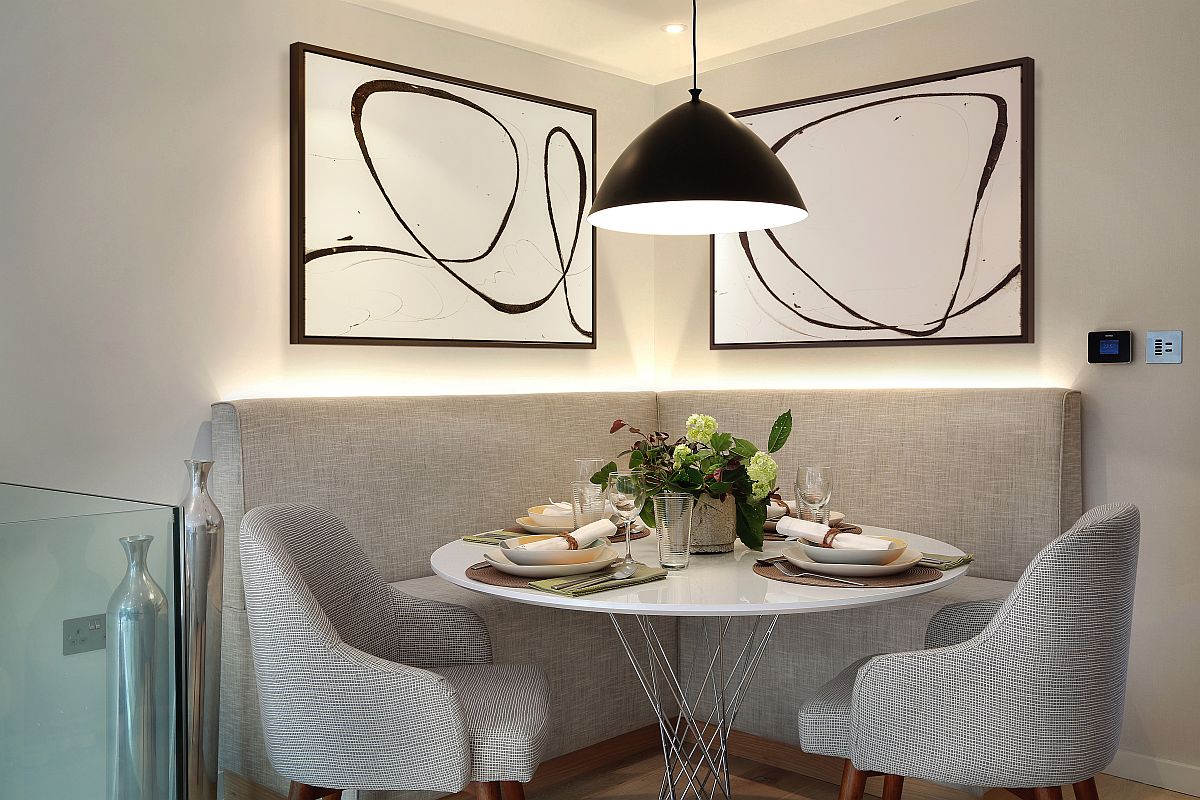 LED strip ligting and pendant lamp turn the corner banquette dining into a cheerful and visually spacious setting