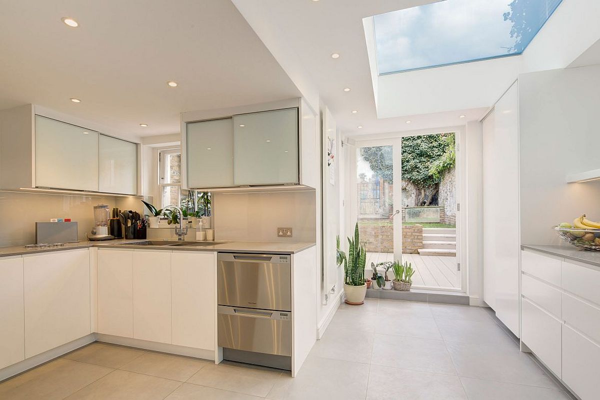 Large skylight enlivens the new kitchen space of the London home