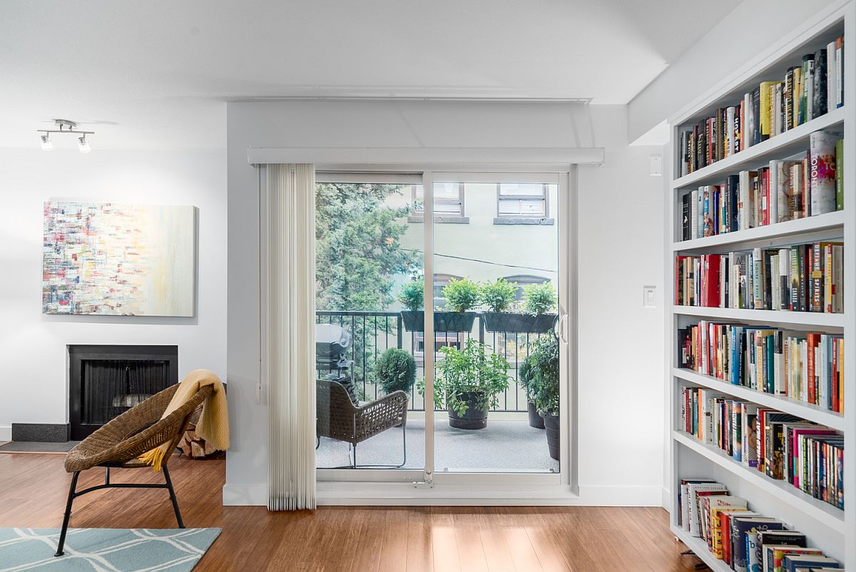 Large sliding glass doors bring light into the small interior