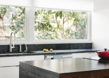 Large-window-connects-the-kitchen-with-the-green-yard-outside-217x155